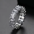 Elegant silver-toned eternity ring featuring baguette-cut sparkling clear zirconia stones. - Size 6 / Silver Multicolor Zircon