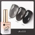 Vernis gel gris translucide UR SUGAR 15ml URJ033 montrant l'effet de 1 à 3 couches - Gris Gelée (J033)