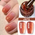 Smalto gel gelatina traslucido arancione-marrone con finitura glitterata fine JN70 - Marrone Arancio Caldo Scintillante (NJ70)