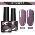 Set da 2 pezzi di smalto gel Née Jolie con malva solido e glitter viola, flaconi da 8,5 ml. - Set da 2 / Malva (014) e Viola Brillantinato (073)