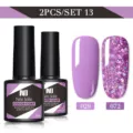 Set da 2 pezzi di smalto gel Née Jolie con viola pieno e glitter viola - Set da 2 / Viola Scuro (029) e Paillettes Viola (072)