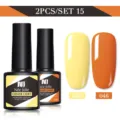 Set da 2 smalti gel Née Jolie nei colori giallo e arancione, da 8,5 ml ciascuno. - Set da 2 / Giallo Brillante (040) e Arancione Brillante (046)