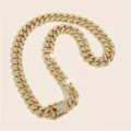 Detailed macro shot of the sparkling rhinestone pavé on a gold Cuban link chain - Pave Cuban Link / 55cm x 1.3cm / Gold