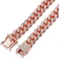 Detailed macro shot of iced out rose gold Cuban link necklace with pave set rhinestones - 18cm / Rose Gold