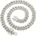 Detailed view of an iced-out silver Cuban link necklace with sparkling rhinestones. - Necklace 55cm / Silver