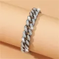 Detailed view of silver iced out Cuban link chain with shimmering rhinestones - 25cm / Silver