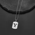 Detail view of a silver stainless steel pendant necklace with a cutout letter Y - Letter Y
