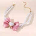 Elegante parelhalsband voor huisdieren met grote roze satijnen strik en hartje - XS-Small / 20cm / Roze