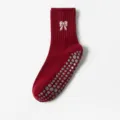 Calcetines de yoga antideslizantes rojos con bordado de lazo blanco y agarres de silicona - Talla única / Rojo