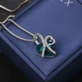 Silver-tone heart necklace featuring a blue crystal and 'I love you forever' engraving - Classic Engraved Style / Dark Green