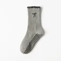 Grey mid-calf yoga socks with black bow embroidery and non-slip silicone sole - Gray