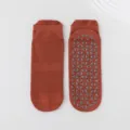 Rust red non-slip yoga socks featuring grey triangular silicone grips for pilates and fitness - Adult 36-44 / Caramel color