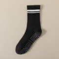 Zwarte antislip yogasokken met witte strepen en grijze zeshoekige gripzool voor sport. - Zwart met witte strepen