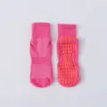Atmungsaktive pinkfarbene Trampolin-Antirutschsocken mit strukturierten Silikon-Grips. - Kinder (1-4J) / Fuchsia