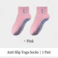 Professional pink non-slip yoga socks for women featuring blue heart silicone dots - One Size / Pink