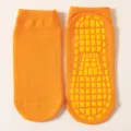 Calcetines antideslizantes naranja para trampolín con puntos de goma para yoga y fitness - 1 año-4 años / Rojo Anaranjado