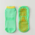 Grüne Mesh-Trampolinsocken mit orangen Anti-Rutsch-Silikon-Grips für Kinder und Erwachsene - Grün
