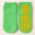 Calcetines antideslizantes verdes con agarres amarillos para niños y adultos - Verde