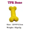 Giocattolo da masticare per cani a forma di osso giallo con punte in TPR - Osso in TPR Squeaky / 22x6x3.5cm
