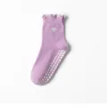 Purple non-slip yoga socks featuring a white frill cuff and delicate heart embroidery - Purple