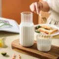 Minimalist ribbed glass pitcher and cup set for refreshing cold drinks and milk. - Large (600ml Pitcher + 200ml Cup)