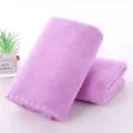 Close-up of soft purple microfiber towels with delicate scalloped lace edges - 30x70cm / 1 Piece / Purple