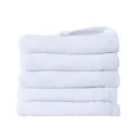 Close-up stack of five premium ultra-soft pure cotton white towels for hotel use - 30*70cm / 40g