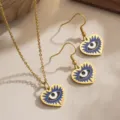 Detailed view of heart-shaped evil eye jewelry set with blue enamel and gold finish - Blue Heart Style (80487)