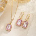 Detail of elegant bridal jewelry set with purple iridescent gemstones and gold plating - Light Purple Iridescent Rectangle Set (80039+10092)