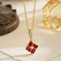 Close-up detail of vintage square pendant necklace with red zircon and crown motif - Pendant Necklace (80489) / Red
