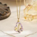Detailed macro view of gold heart-shaped Mama necklace with purple enamel flower - Purple-Mama Style (With Chain)