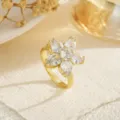 Macro view of an elegant gold flower ring with sparkling zircon petals on cream fabric - Six-Petal Pear-Shaped Diamond Style (80379) / Open Adjustable