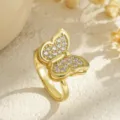 Macro detail of a rotatable gold butterfly ring decorated with cubic zirconia stones - Enamel Butterfly Style (80340) / Open Adjustable