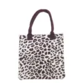 Detailed view of the high quality knitted fabric and leopard print on this tote bag - Brown White Leopard