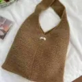 Handmade brown chunky knit hobo tote bag featuring minimalist egg tag on white fabric - One Size / Khaki