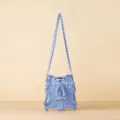Modern blue pleated knitted crossbody bag with unique ribbed texture and long strap - Light Blue