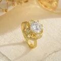 Detailed view of elegant gold flower spinning ring with sparkling crystal stone - Multi-Layer Clear Center Stone Style (80412) / Open Adjustable