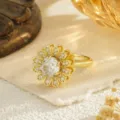 Close-up of a gold-plated flower ring with micro-inlaid zircon and rotatable petals - Open Adjustable / Daisy Style (80383)