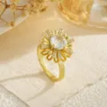Macro detail of the elegant rotating gold flower ring set with sparkling zircon stones - Hollow Zirconia Flower Style (80421) / Open Adjustable