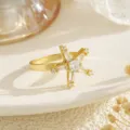 Close-up view of the rotating star element with micro-paved clear zirconia stones - Gold Micro-Pave Hexagram Star Snowflake Style (80408)