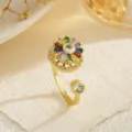 Macro detail of a rotatable gold-plated flower ring inlaid with vibrant colorful zircons - Multicolor Gradient Flower Style (80407)