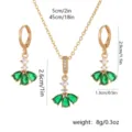 Elegant gold-tone jewelry set with green zircon pendants and skirt design - Ballet Girl Jewelry Set (10408-With Stainless Steel Chain) / Earrings and Pendant Set (With Chain)