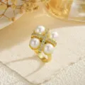 Detailed macro view of a gold open ring featuring four pearls and zircon-set cross - Four Pearl Symmetrical Design (80424)