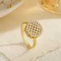 Detailed macro view of a gold-plated rotating ring featuring sparkling round zircons - Tiered Rhinestone Cluster (80404) / Open Adjustable / Gold
