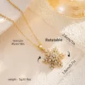 Gold rotatable snowflake necklace with sparkling zirconia and size measurements. - Rotatable Snowflake Style (80472)