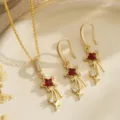 Elegant vintage shooting star jewelry set with red zircon stones in a polished gold finish - Jewelry Set (80495) / Red