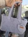 Handmade lavender knitted underarm bag featuring a small pouch with Hand Made tag - Light Gray