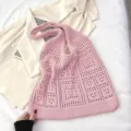 Sac bandoulière rétro en maille rose ajourée avec texture tissée - Rose