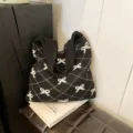 Large capacity knitted tote bag featuring black and white bow pattern with argyle design - Black Bow