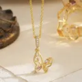 Close-up of a French retro gold hollow butterfly pendant necklace with pink zircon - Hollow Butterfly (80491) / Pendant with Stainless Steel Chain / Pink